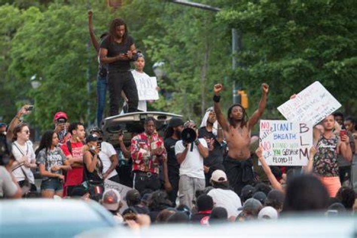 
Violent Protests Erupt in Atlanta Over Fatal Shooting of Activist 
